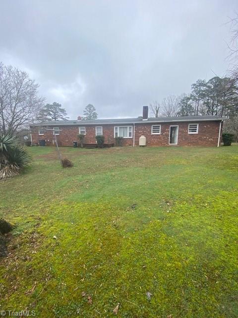 1199 Haymeadow Road Hays, NC 28635 - Photo 6 of 27 Den with wood beams and gas log fireplace