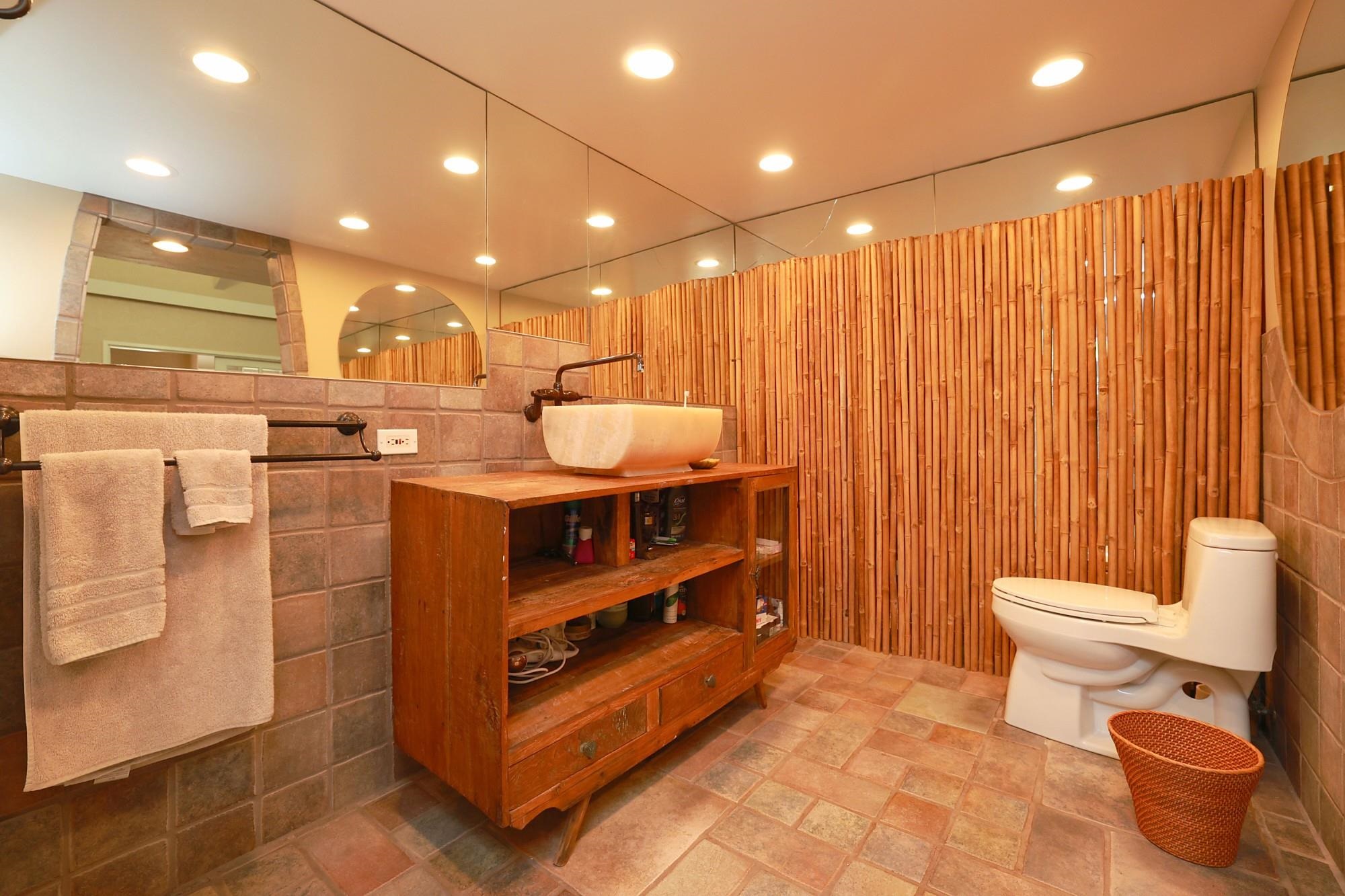 5045 Lower Honoapiilani Road, Unit 2 Lahaina, HI 96761 - Photo 23 of 37 a bathroom with a sink a toilet and shower