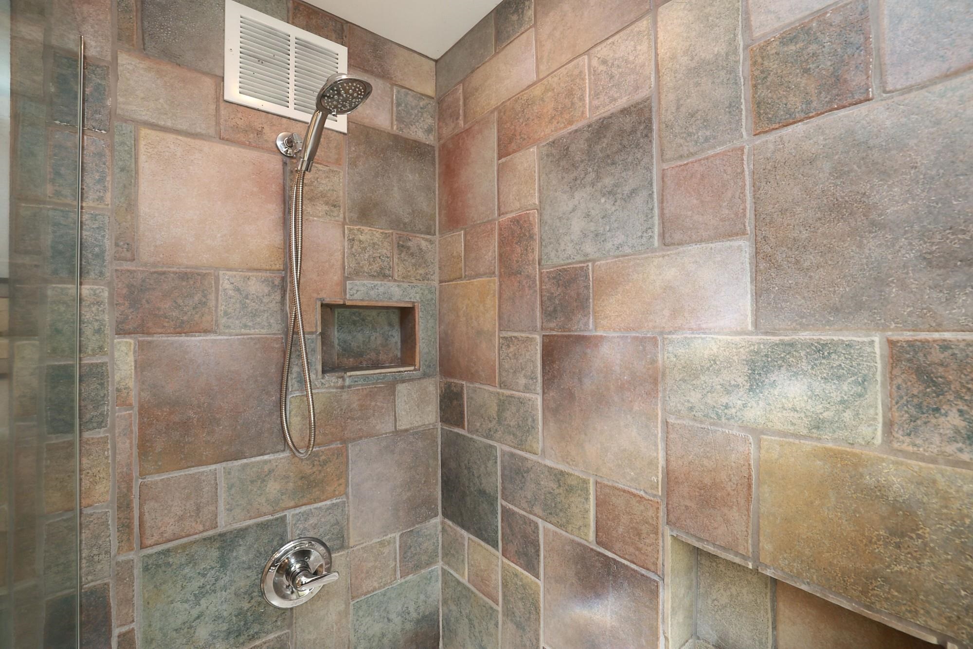 5045 Lower Honoapiilani Road, Unit 2 Lahaina, HI 96761 - Photo 27 of 37 a bathroom with a shower