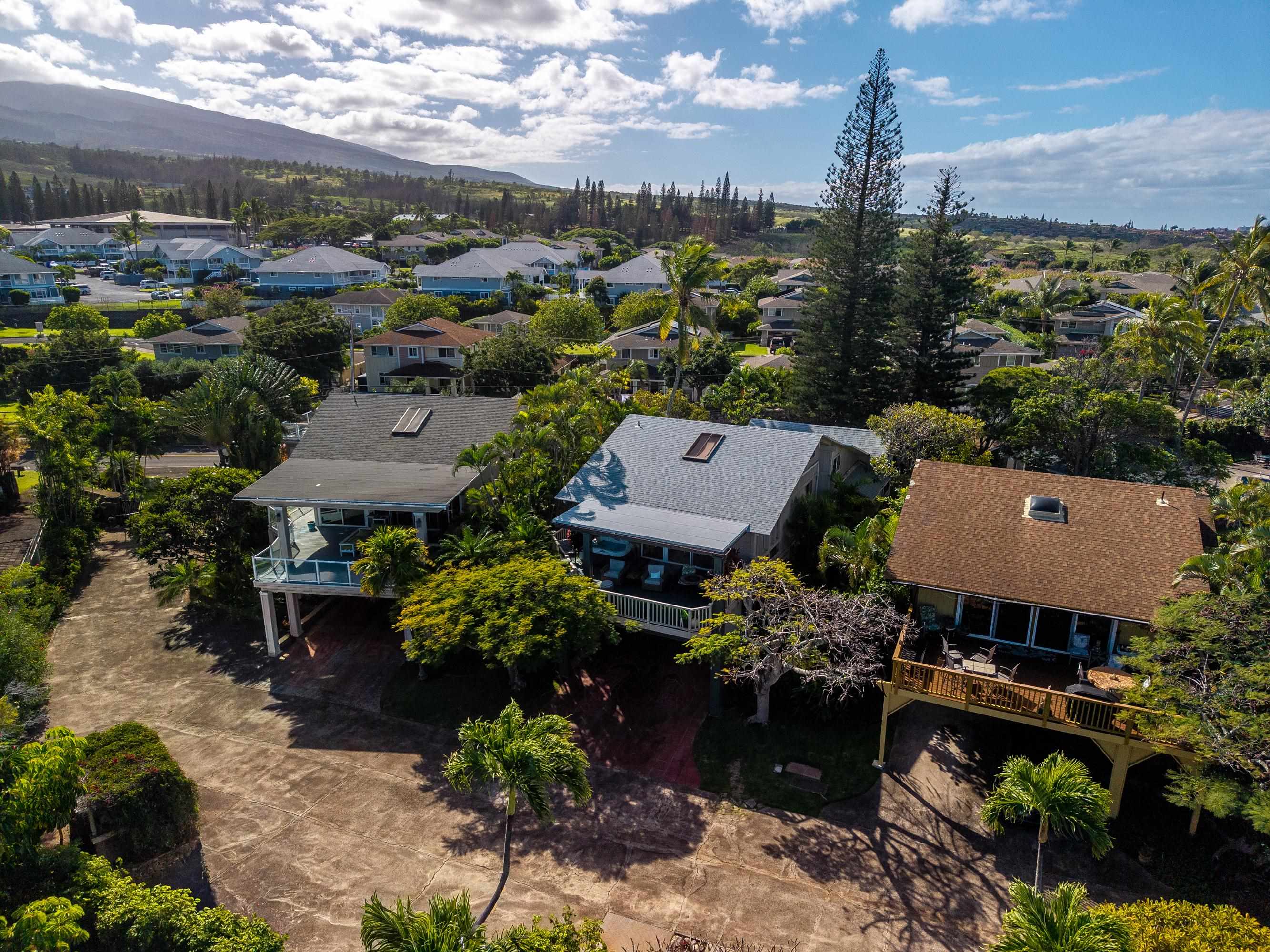 5045 Lower Honoapiilani Road, Unit 2 Lahaina, HI 96761 - Photo 37 of 37 an aerial view of a house with a garden