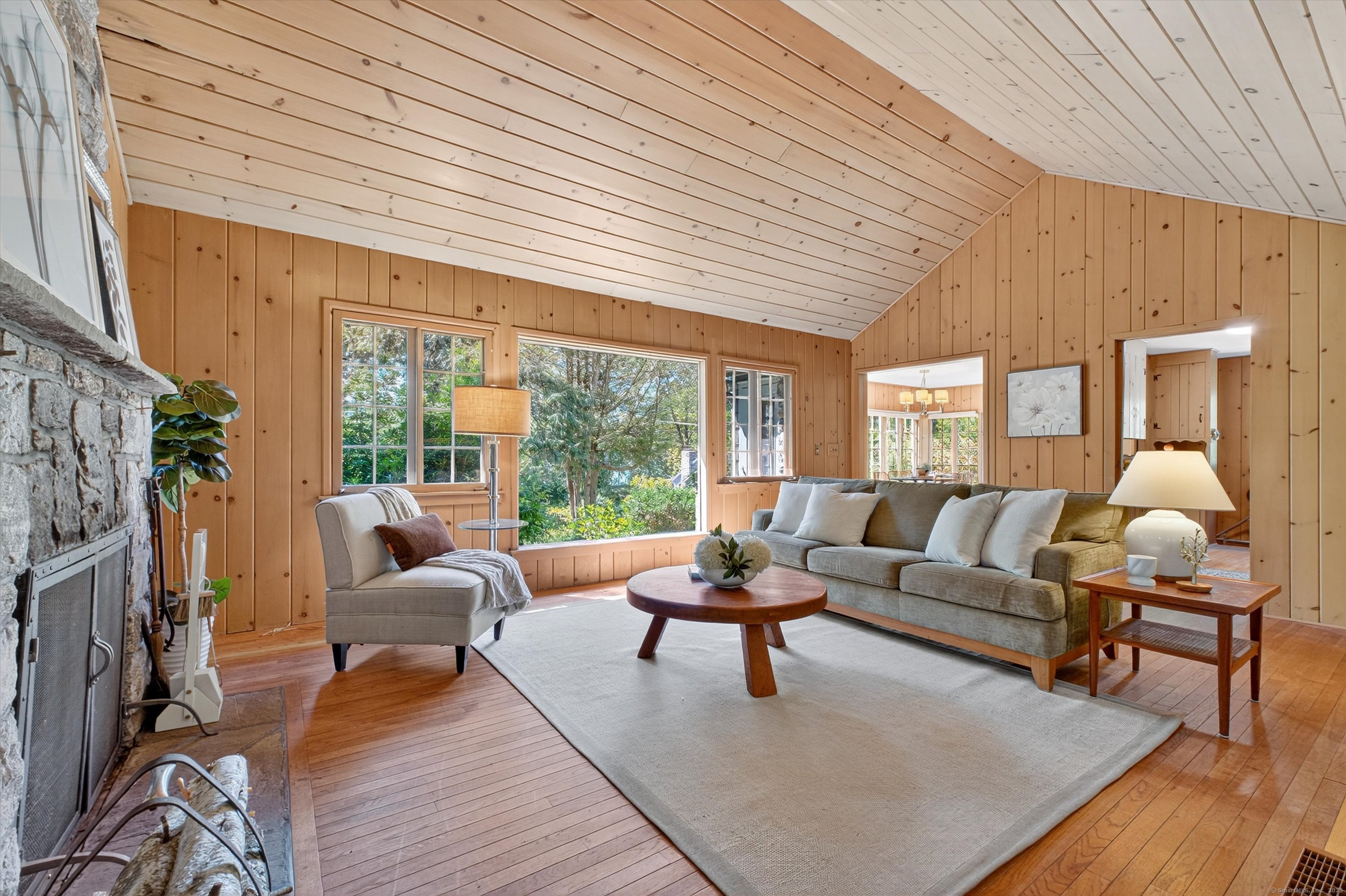45 Indian Trail Brookfield, CT 06804 - Photo 11 of 40 a living room with furniture and a large window