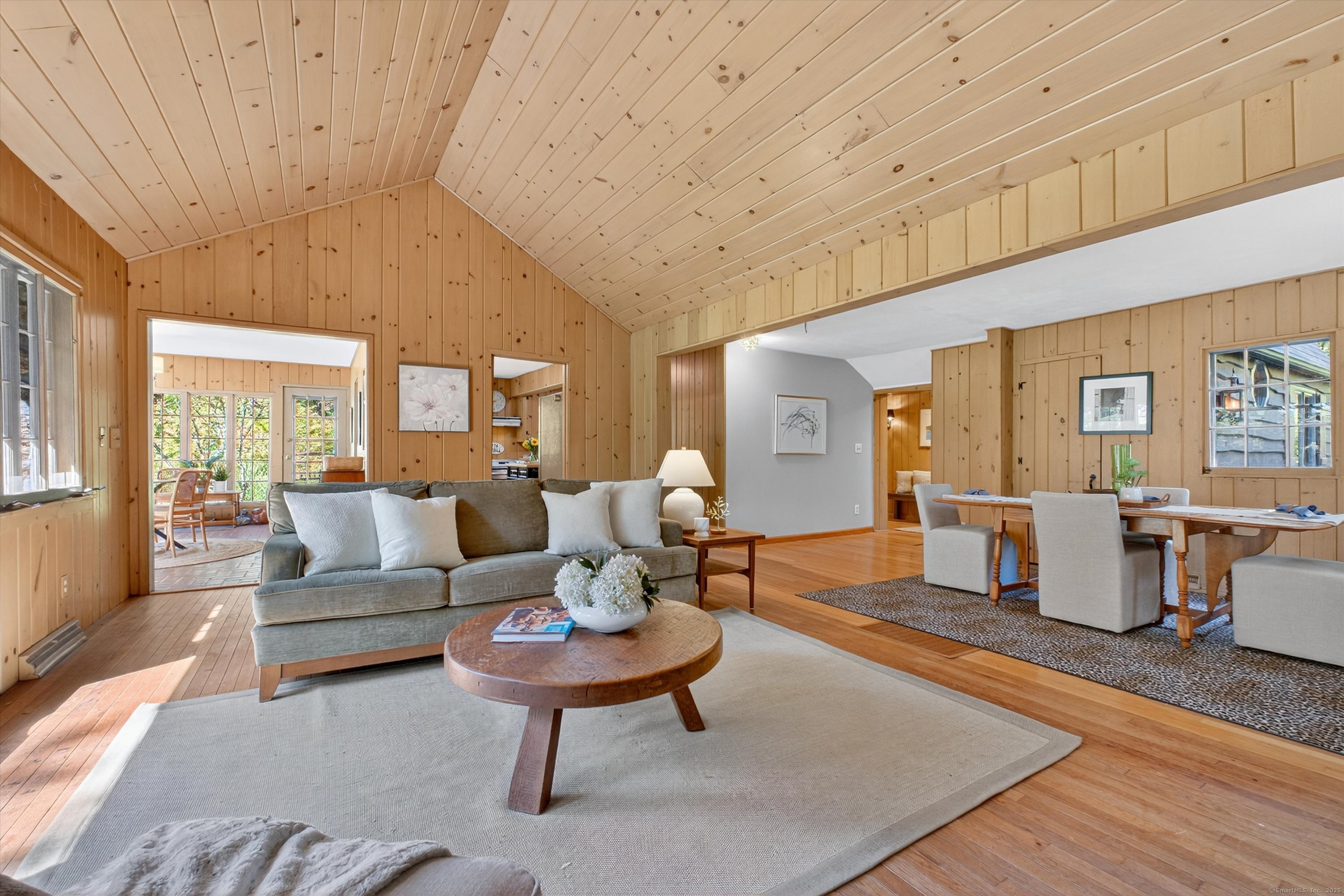 45 Indian Trail Brookfield, CT 06804 - Photo 12 of 40 a living room with furniture a table and wooden floor