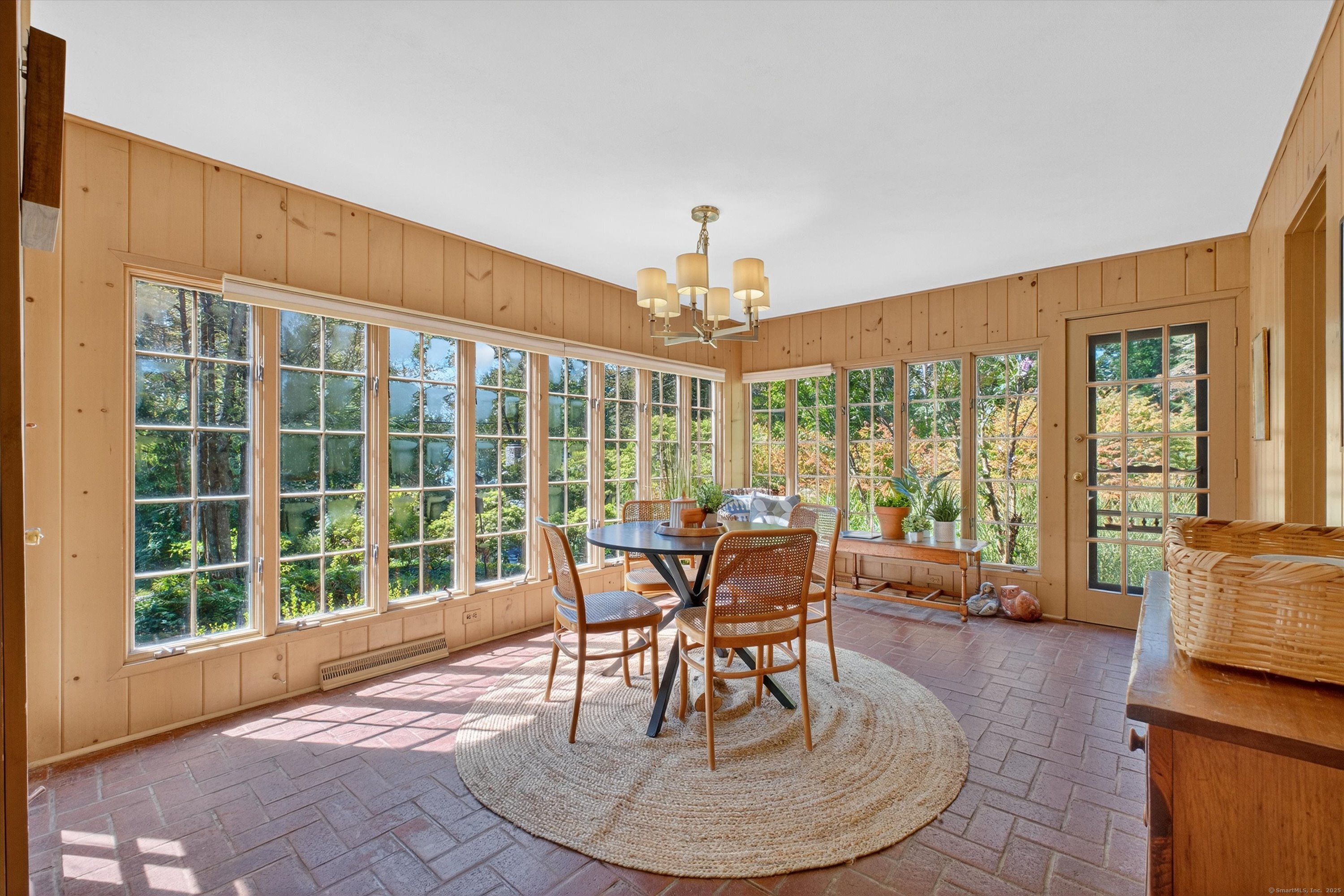 45 Indian Trail Brookfield, CT 06804 - Photo 15 of 40 a living room with furniture and a floor to ceiling window