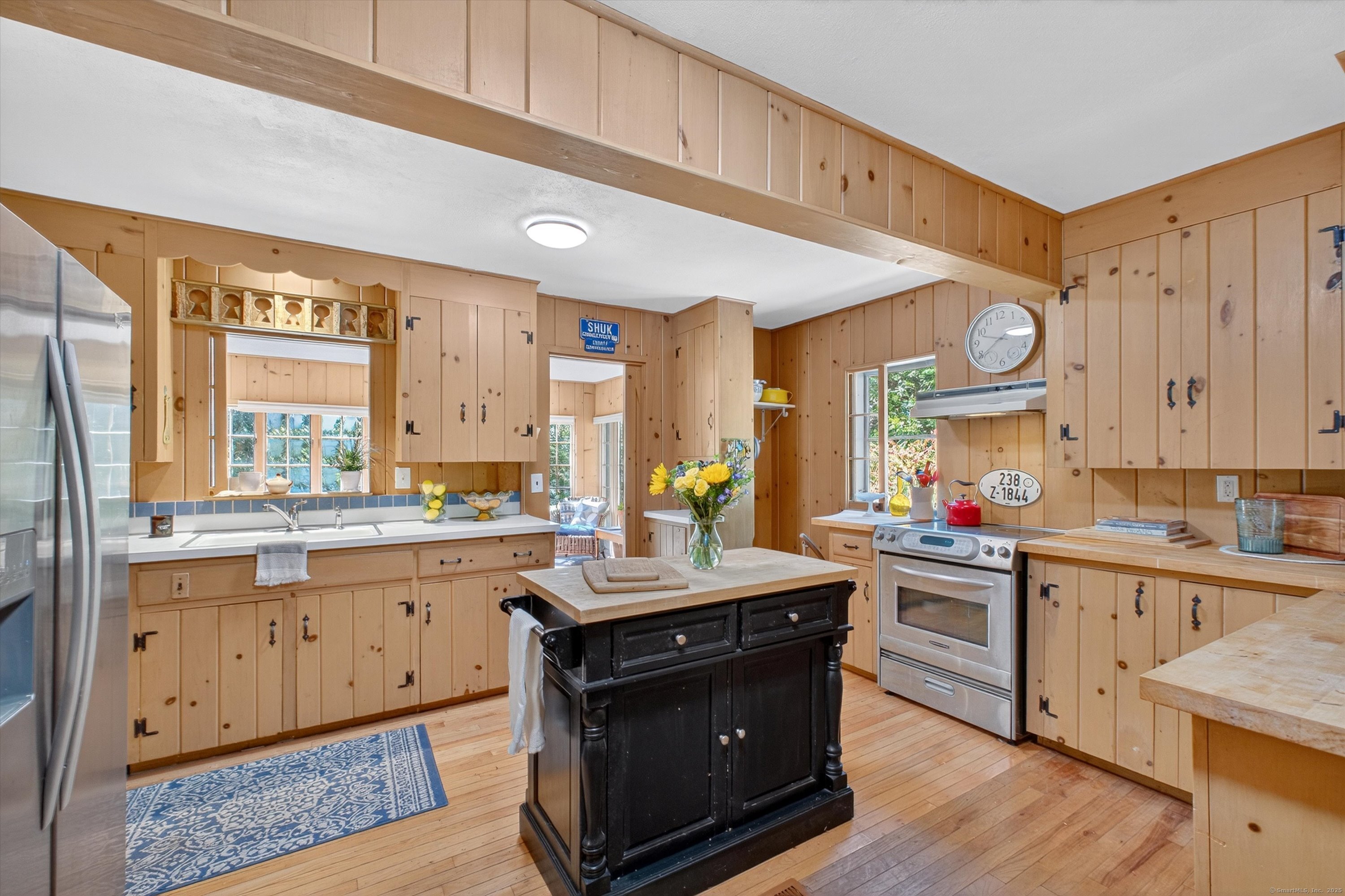 45 Indian Trail Brookfield, CT 06804 - Photo 19 of 40 a kitchen with a sink stove and cabinets