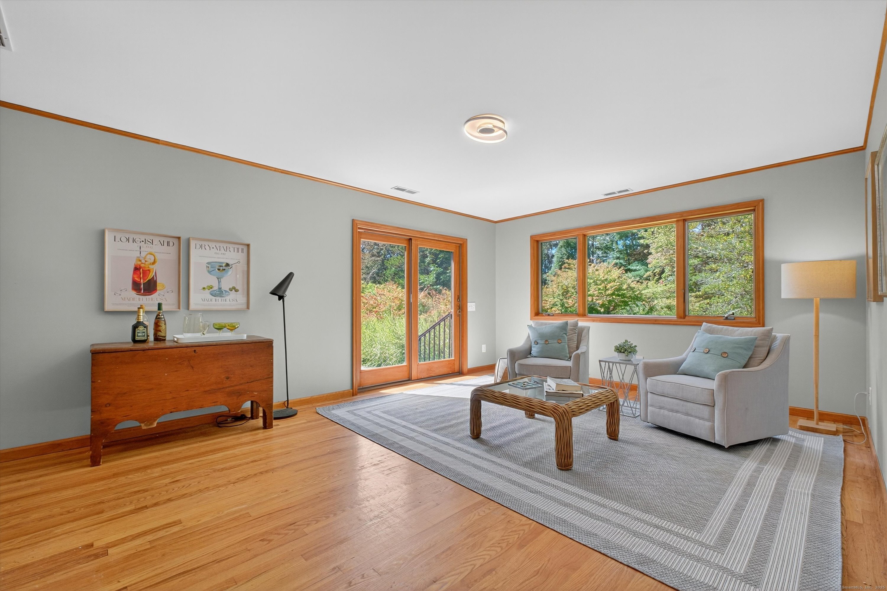 45 Indian Trail Brookfield, CT 06804 - Photo 22 of 40 a living room with furniture and a large window