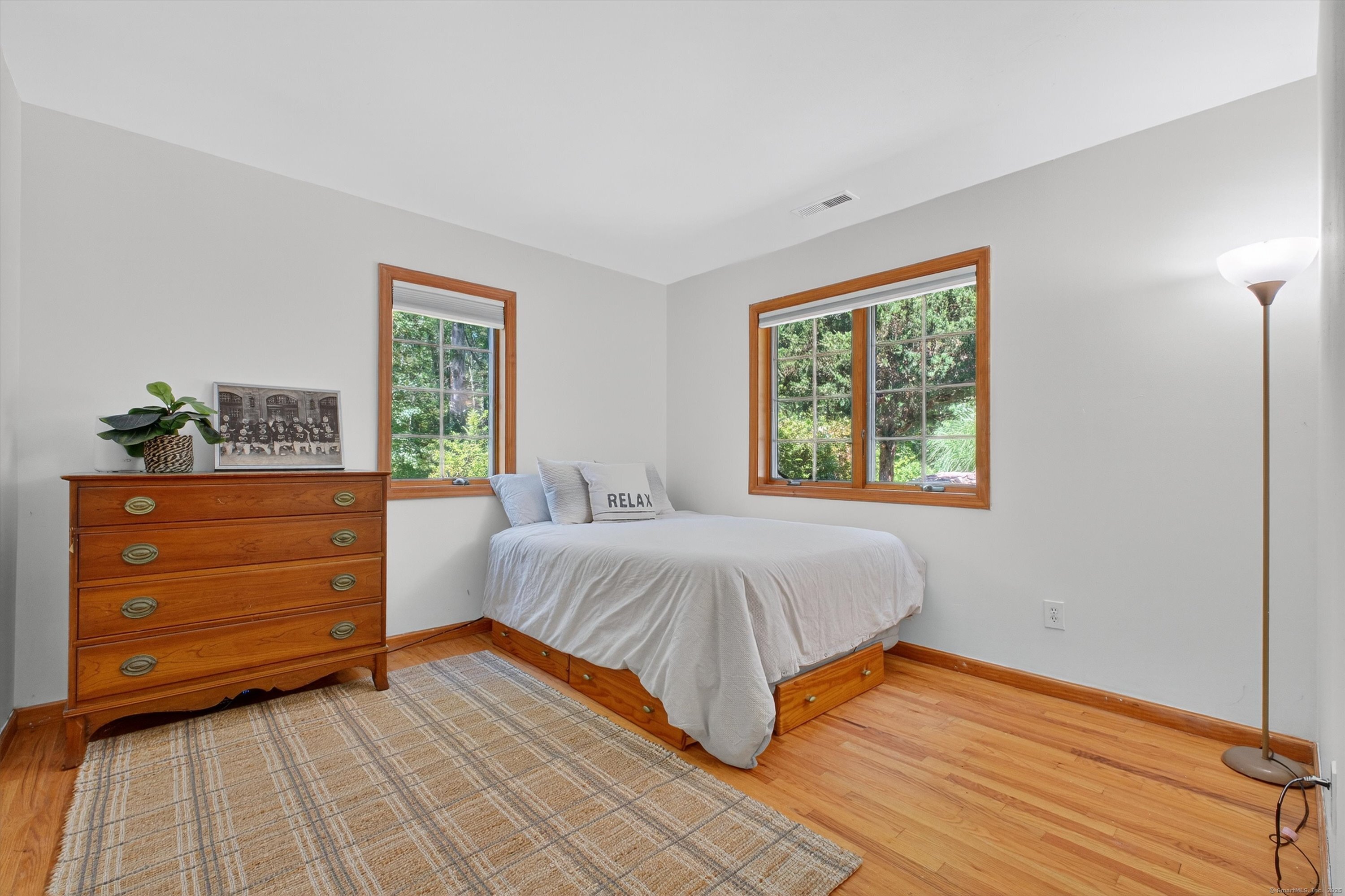 45 Indian Trail Brookfield, CT 06804 - Photo 23 of 40 a bedroom with a bed and a window