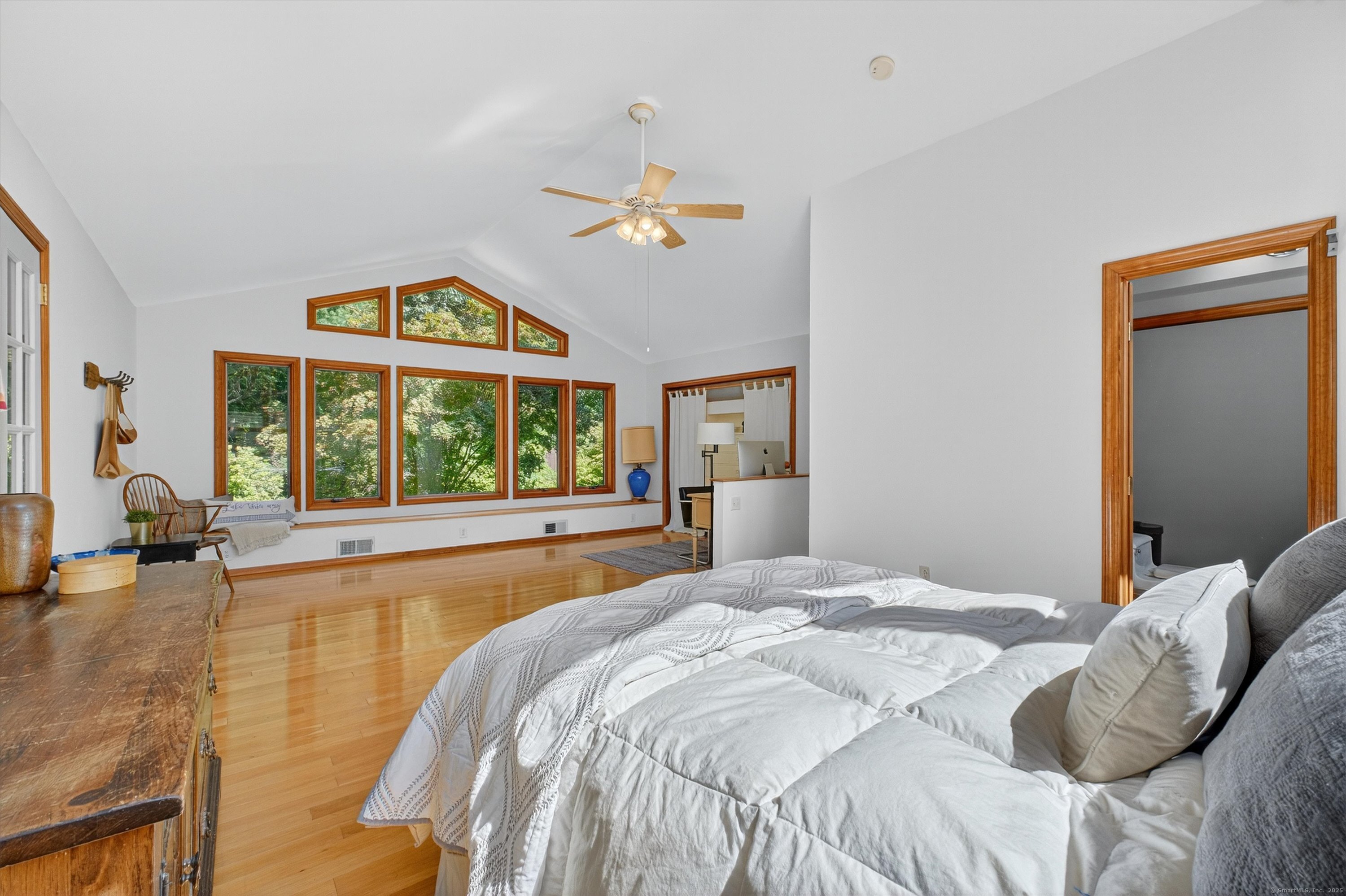 45 Indian Trail Brookfield, CT 06804 - Photo 27 of 40 a bedroom with a bed and a large window