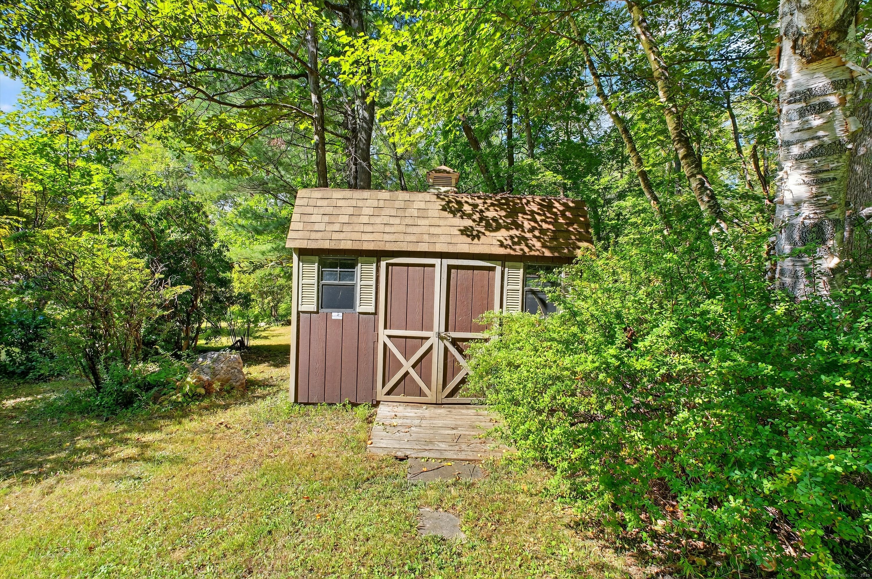 45 Indian Trail Brookfield, CT 06804 - Photo 37 of 40 front view of a house with a yard