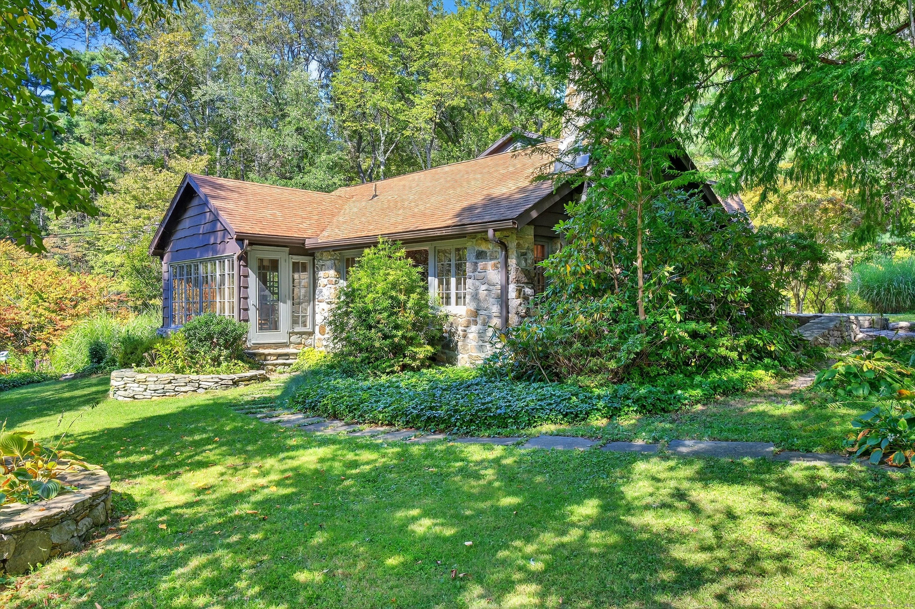 45 Indian Trail Brookfield, CT 06804 - Photo 4 of 40 a view of a house with a yard plants and large tree
