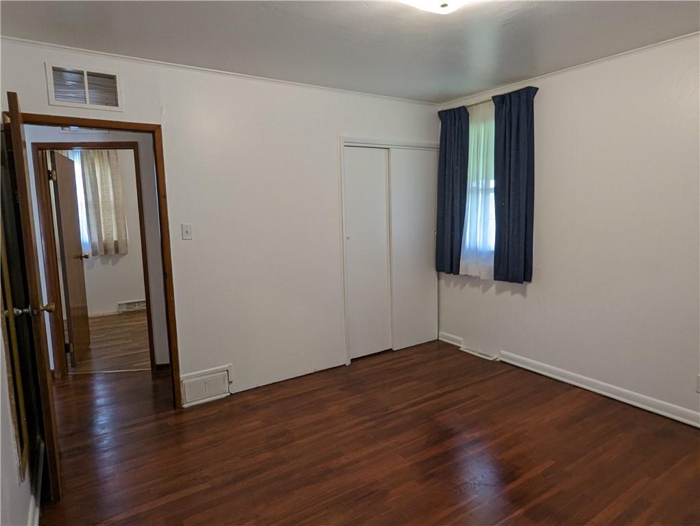 1154 Mars-Evans City Road Mars, PA 16046 - Photo 11 of 17 an empty room with wooden floor and closet