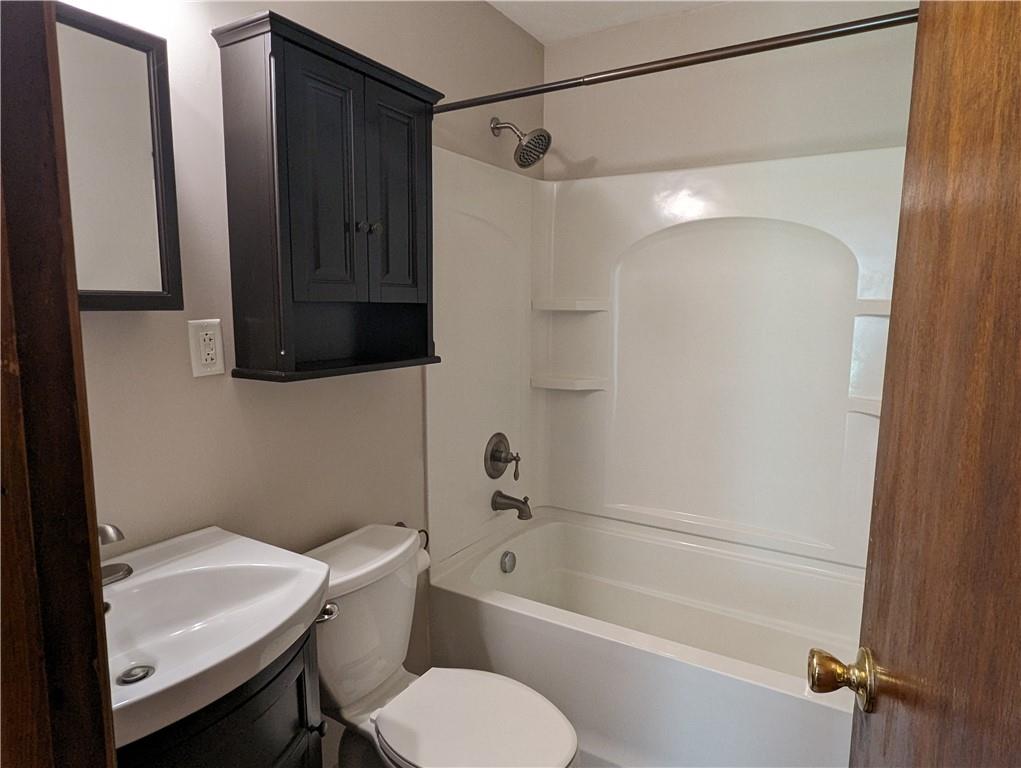 1154 Mars-Evans City Road Mars, PA 16046 - Photo 12 of 17 a bathroom with a sink toilet a mirror and shower