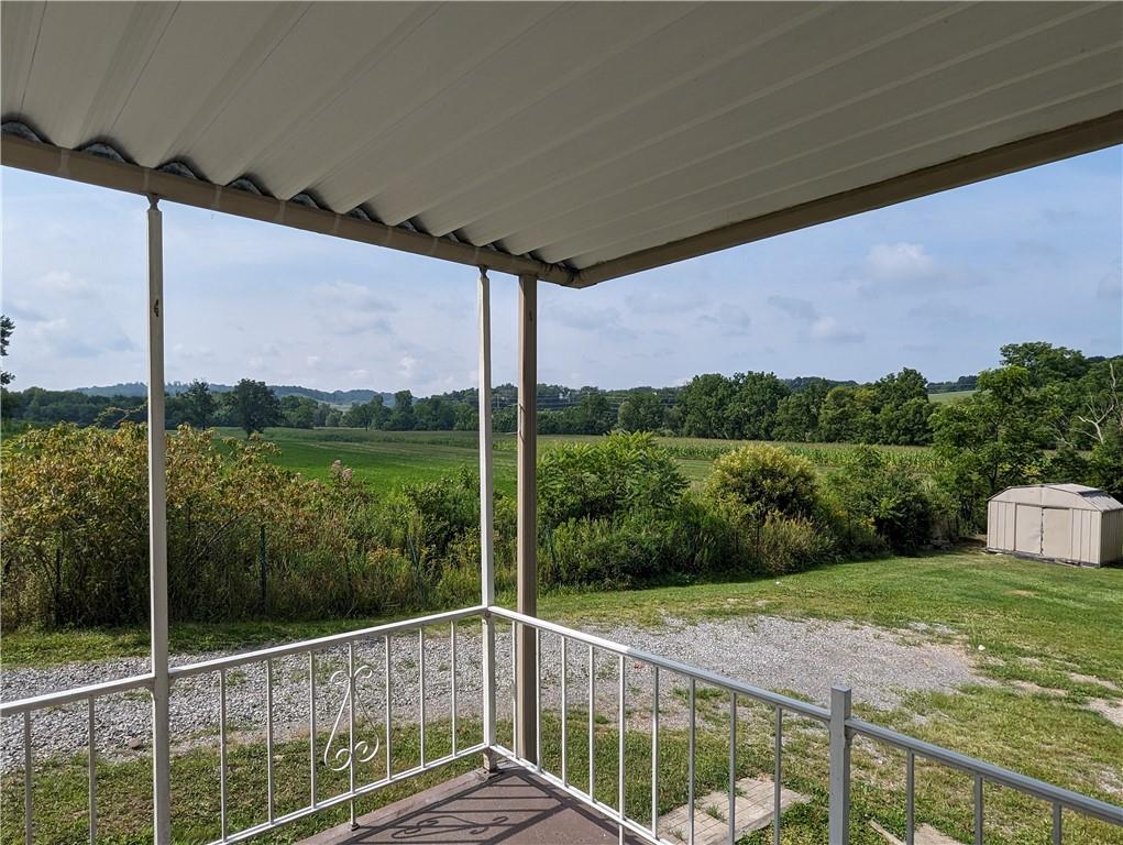1154 Mars-Evans City Road Mars, PA 16046 - Photo 5 of 17 a view of a balcony with yard