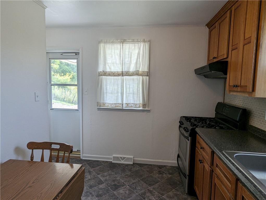 1154 Mars-Evans City Road Mars, PA 16046 - Photo 6 of 17 a room with a chair and a window