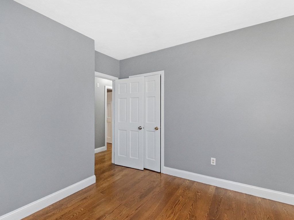 20 Indian Road Tewksbury, MA 01876 - Photo 15 of 30 a view of an empty room with wooden floor