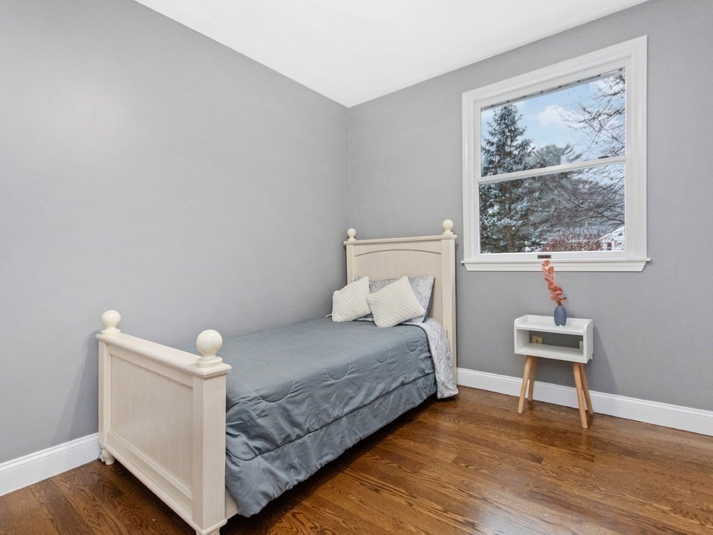 20 Indian Road Tewksbury, MA 01876 - Photo 16 of 30 a bedroom with a bed and a window