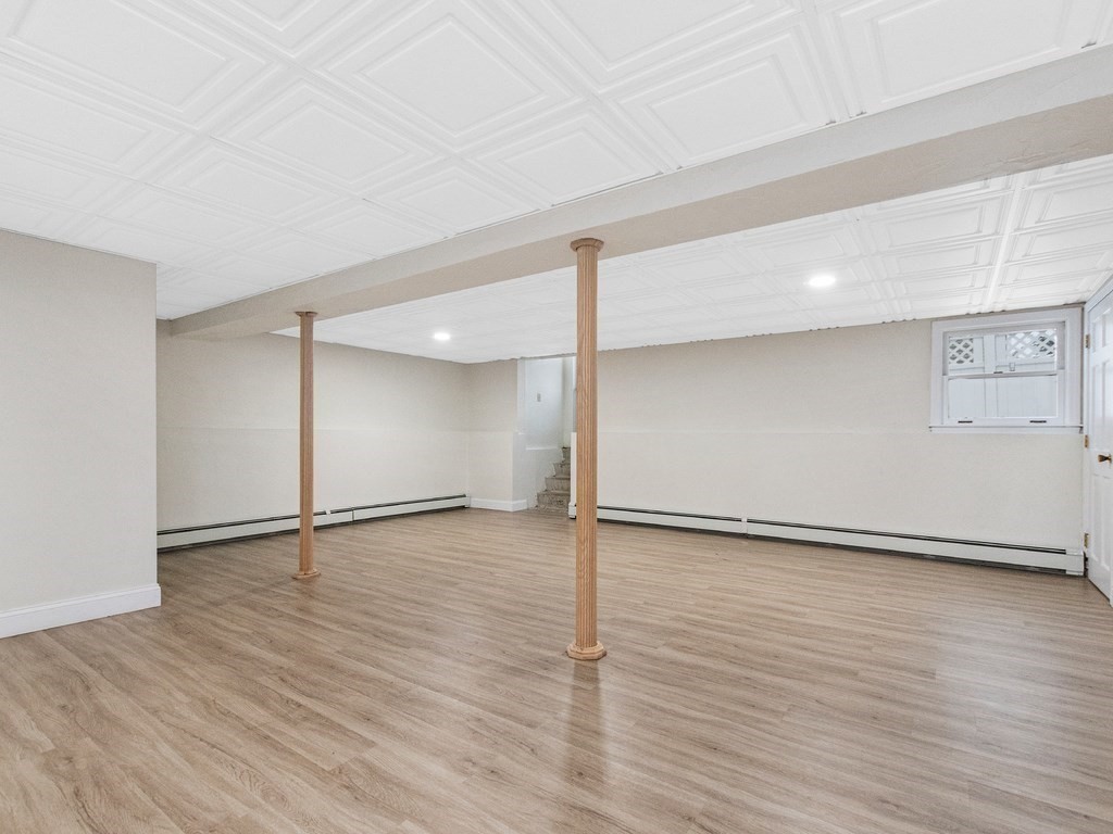 20 Indian Road Tewksbury, MA 01876 - Photo 18 of 30 a view of an empty room with wooden floor