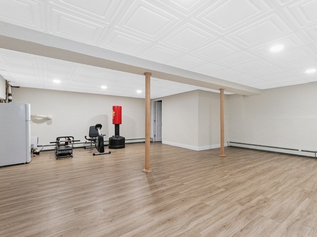 20 Indian Road Tewksbury, MA 01876 - Photo 19 of 30 a view of empty room with wooden floor and ceiling fan