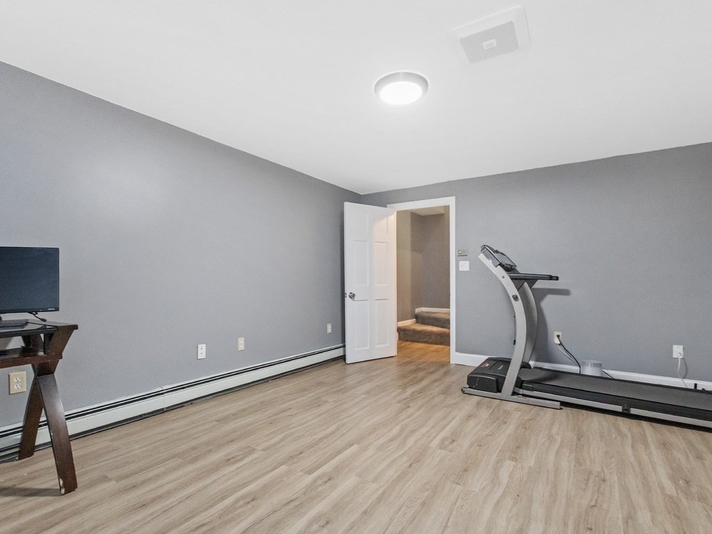 20 Indian Road Tewksbury, MA 01876 - Photo 20 of 30 a view of a room with gym equipment