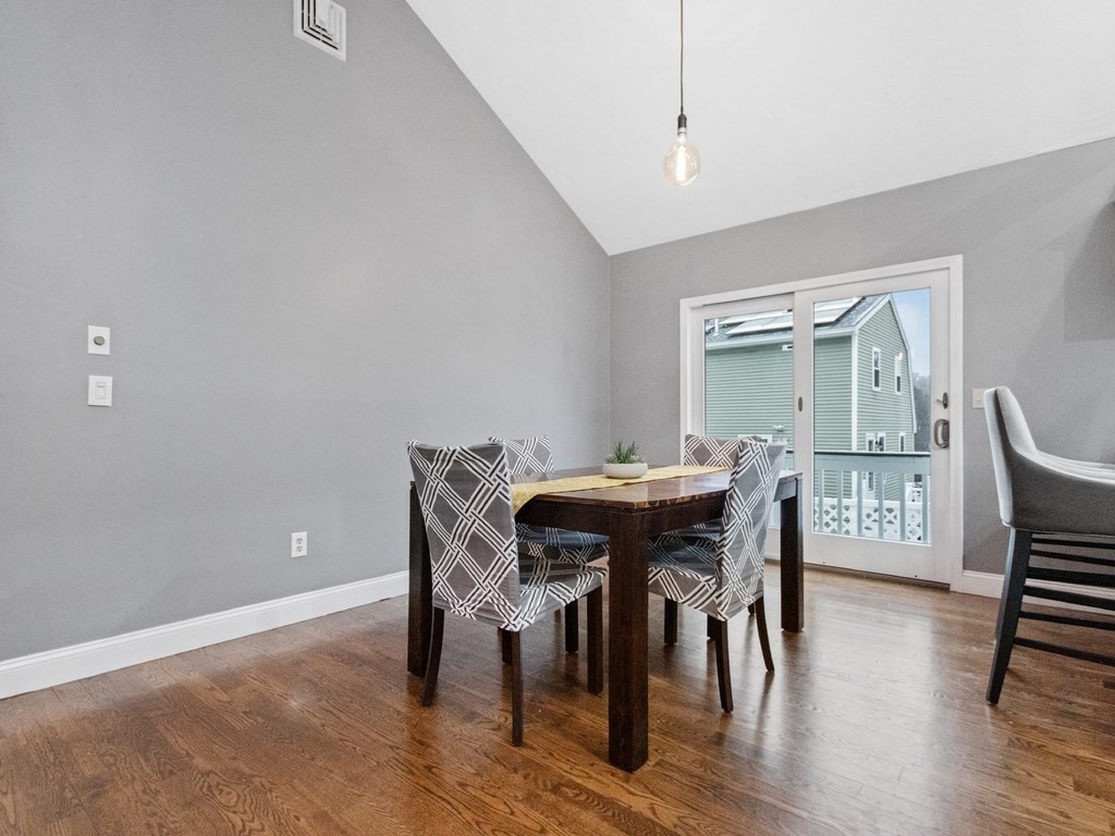 20 Indian Road Tewksbury, MA 01876 - Photo 4 of 30 a view of a dining room with furniture and wooden floor