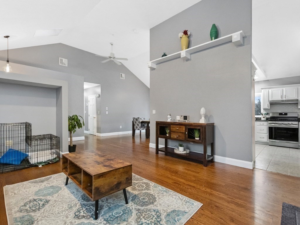 20 Indian Road Tewksbury, MA 01876 - Photo 7 of 30 a living room with furniture and wooden floor