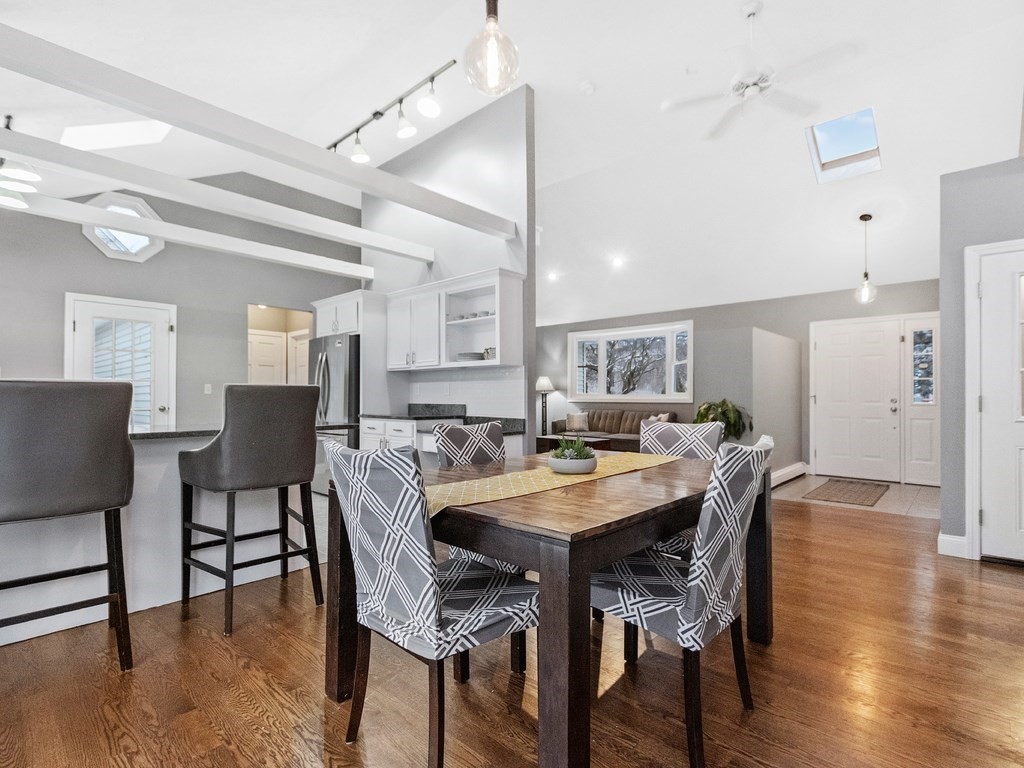 20 Indian Road Tewksbury, MA 01876 - Photo 8 of 30 a view of a dining room with furniture and wooden floor