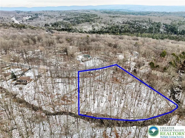 a view of a yard with an outdoor space