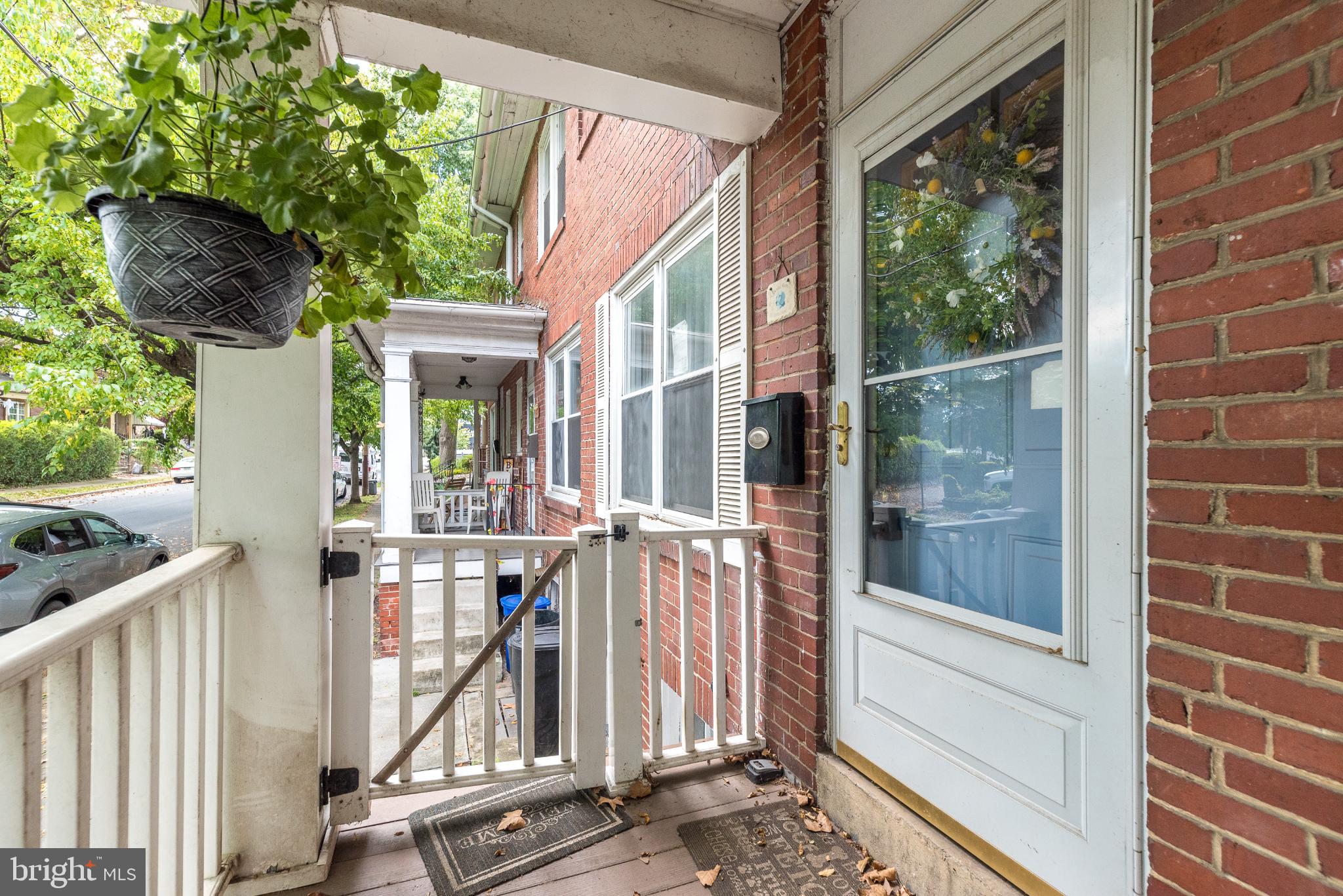 207 Spruce Street Reading, PA 19611 - Photo 2 of 23 Font porch entryway.