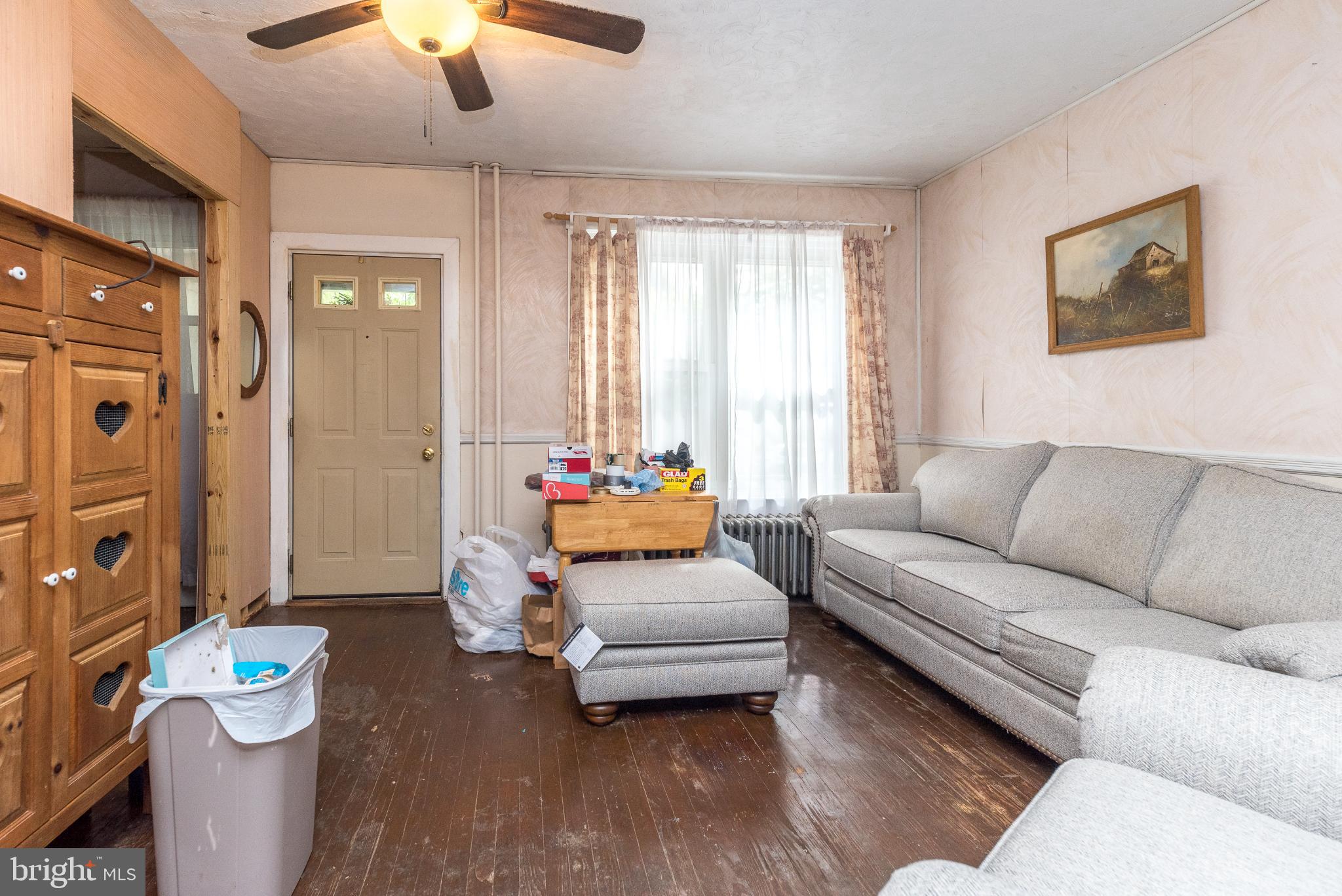 207 Spruce Street Reading, PA 19611 - Photo 5 of 23 Cozy living space with natural light.
