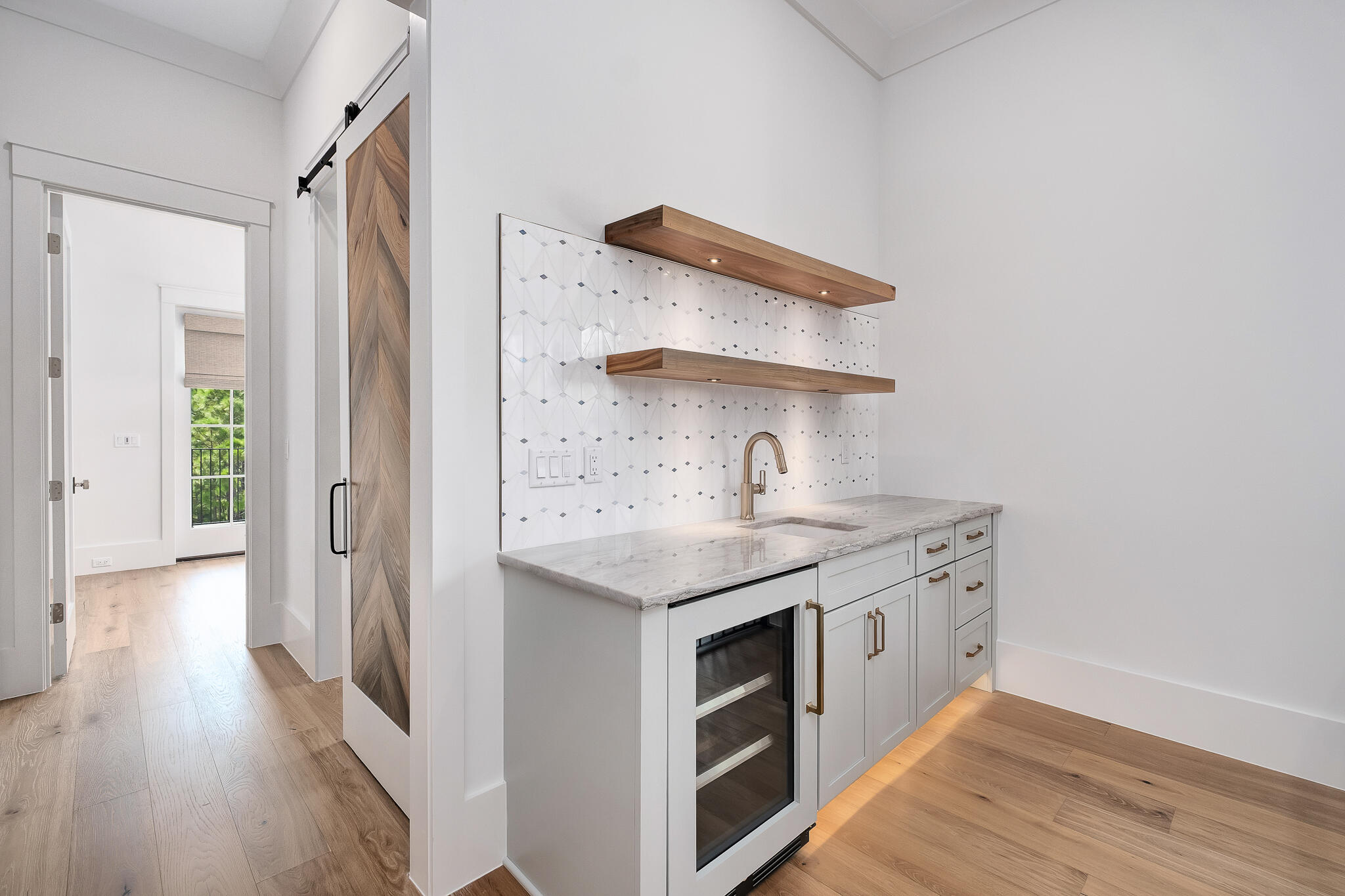 28 Loon Lake Drive Santa Rosa Beach, FL 32459 - Photo 14 of 23 a kitchen with a stove and a wooden floor
