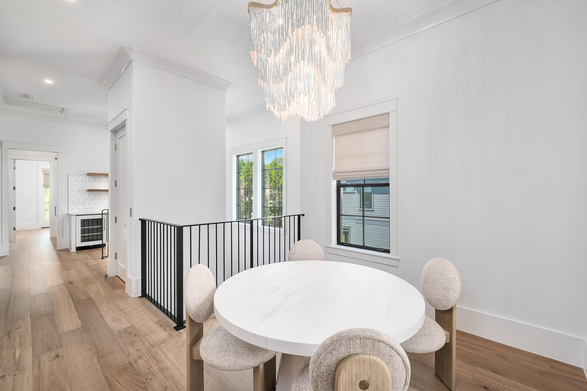 28 Loon Lake Drive Santa Rosa Beach, FL 32459 - Photo 19 of 23 a view of a dining room with furniture wooden floor and chandelier
