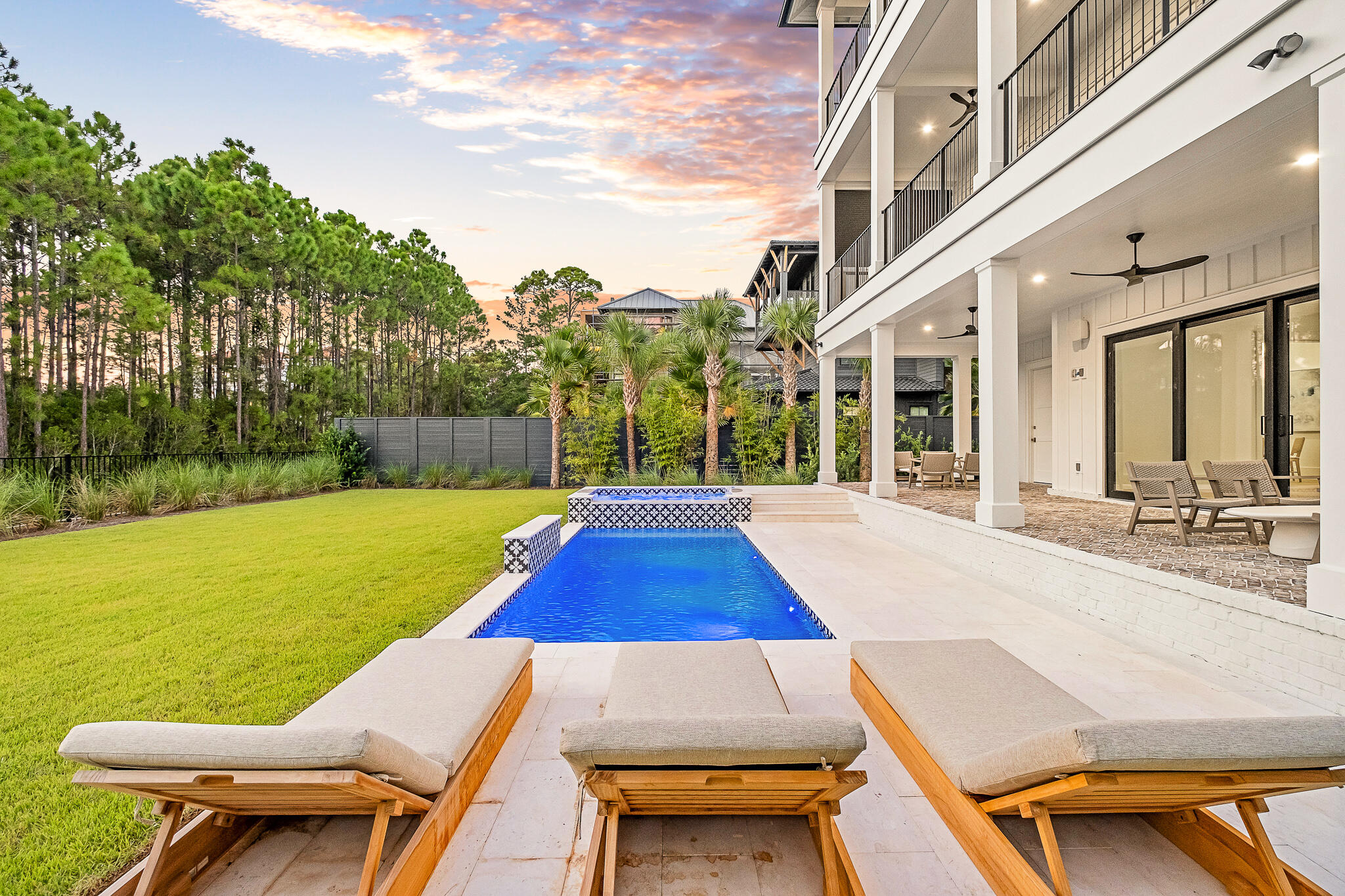 28 Loon Lake Drive Santa Rosa Beach, FL 32459 - Photo 3 of 23 a view of swimming pool with seating area and trees around