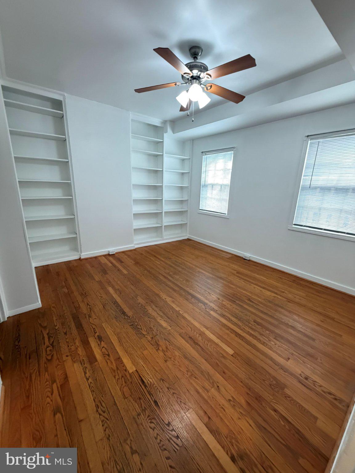 33 East 3rd Street Frederick, MD 21701 - Photo 4 of 16 Bright, airy room with wooden floors.