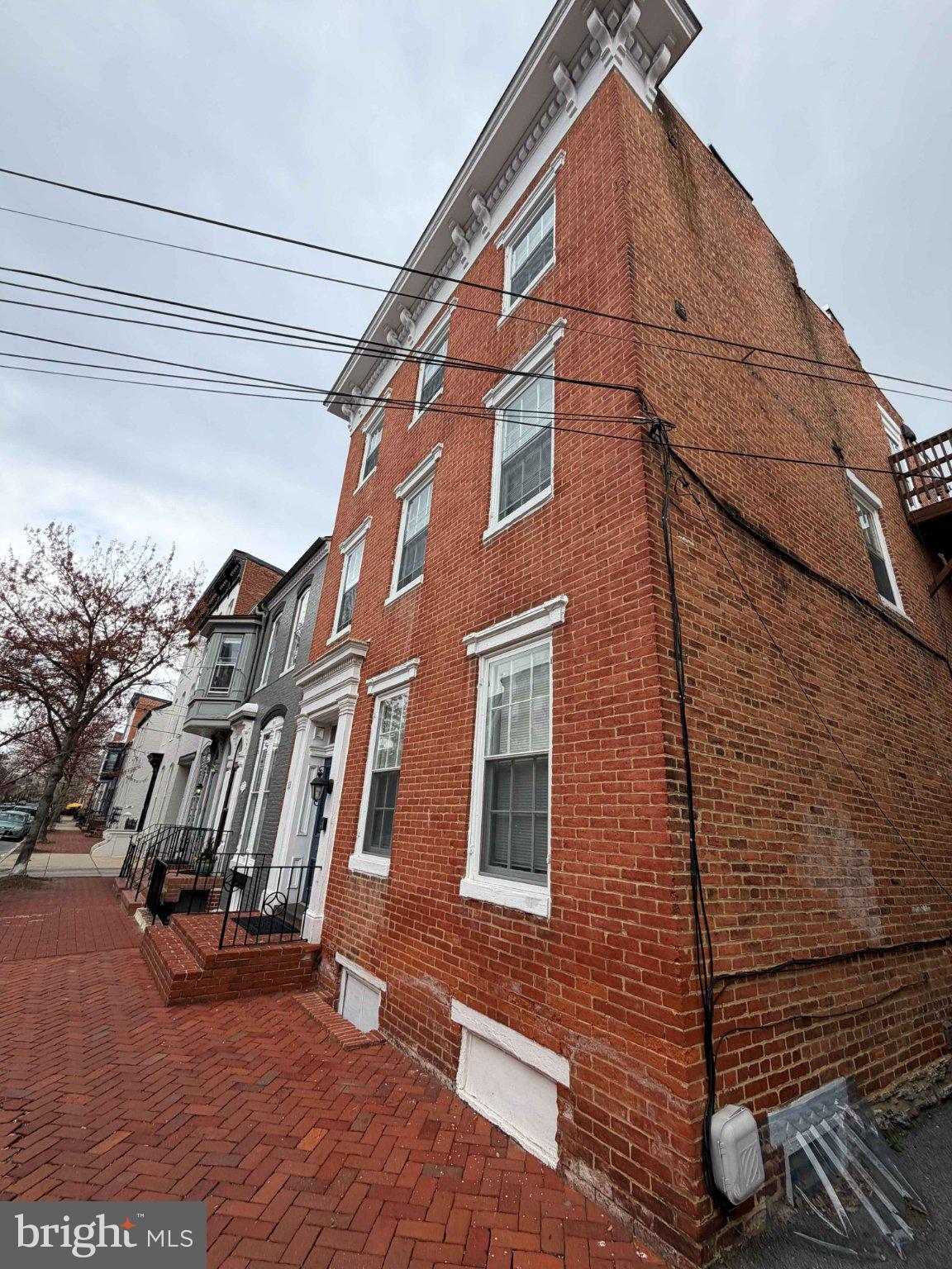 33 East 3rd Street Frederick, MD 21701 - Photo 10 of 16 Charming brick facade with urban flair.