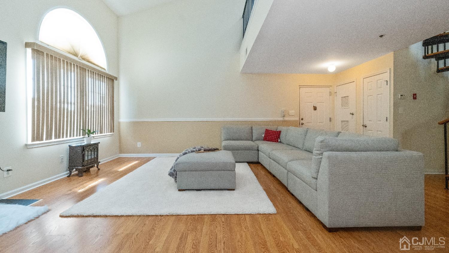 1133 Edpas Road New Brunswick, NJ 08901 - Photo 3 of 26 a living room with furniture and a large window