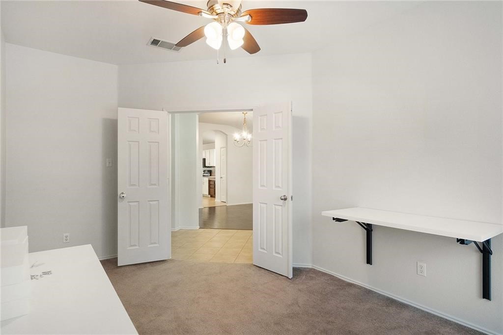 913 Cindy Lane Leander, TX 78641 - Photo 17 of 28 a view of an empty room