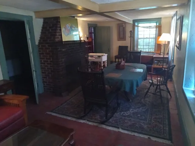 a kitchen with a stove and a refrigerator