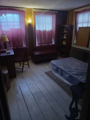 a bathroom with a bathtub and shower