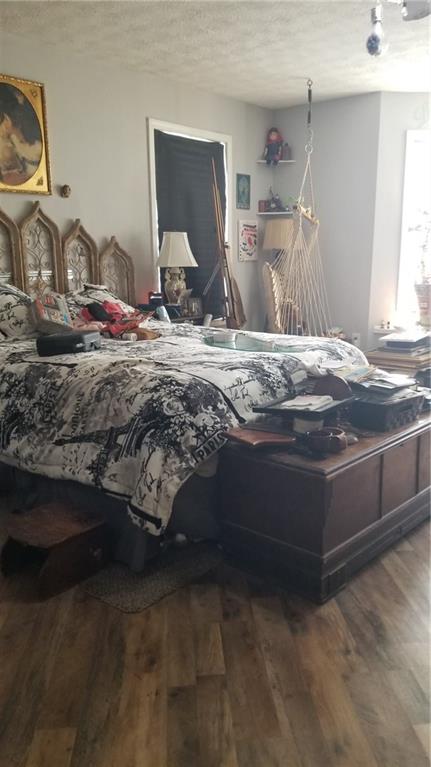 2764 Gulledge Road Dallas, GA 30132 - Photo 17 of 18 a bedroom with a bed and a mirror