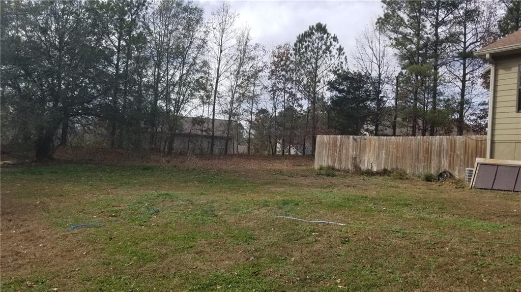 2764 Gulledge Road Dallas, GA 30132 - Photo 2 of 18 a backyard of a house with lots of green space