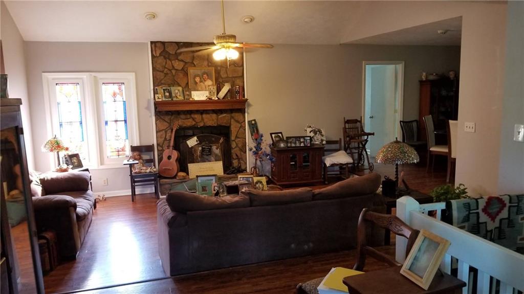 2764 Gulledge Road Dallas, GA 30132 - Photo 4 of 18 a living room with furniture and a fireplace