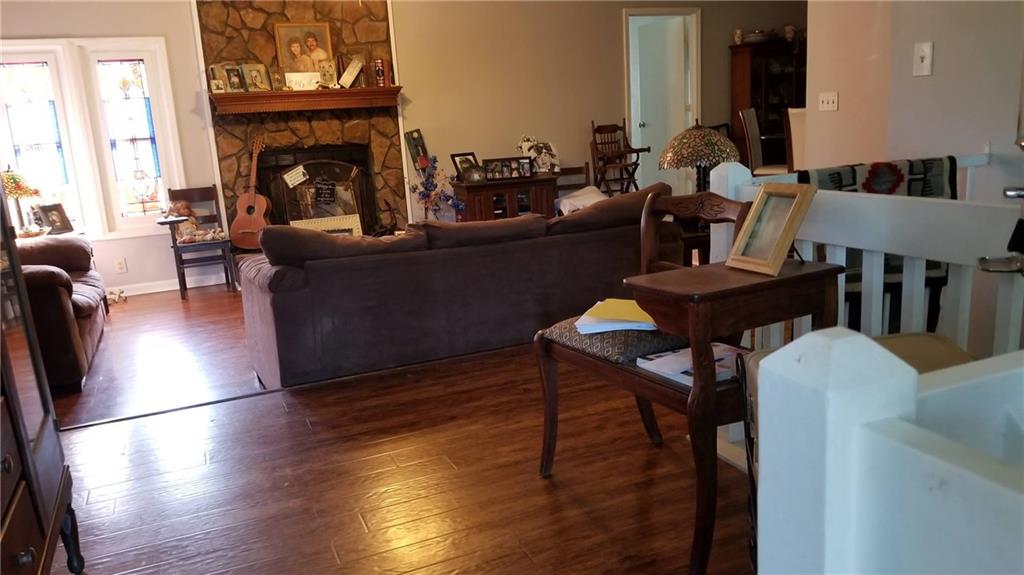 2764 Gulledge Road Dallas, GA 30132 - Photo 5 of 18 a living room with furniture and a fireplace
