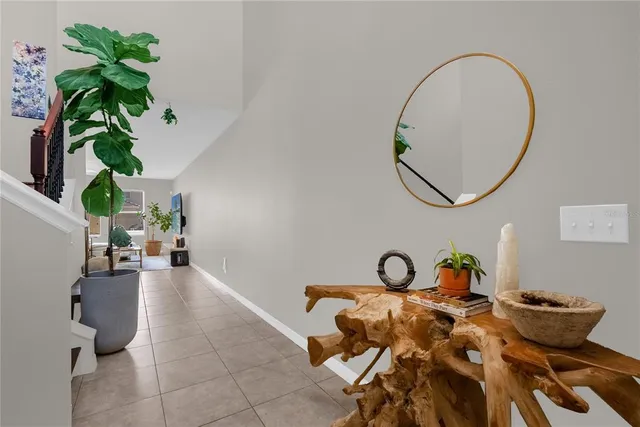 a view of living room with furniture and window
