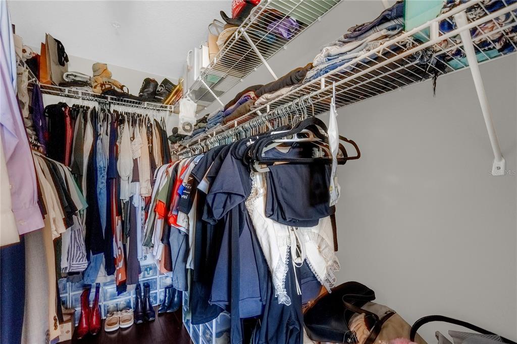 2096 Water Tupelo Way Ocoee, FL 34761 - Photo 23 of 32 a view of walk in closet with clothes and shoes
