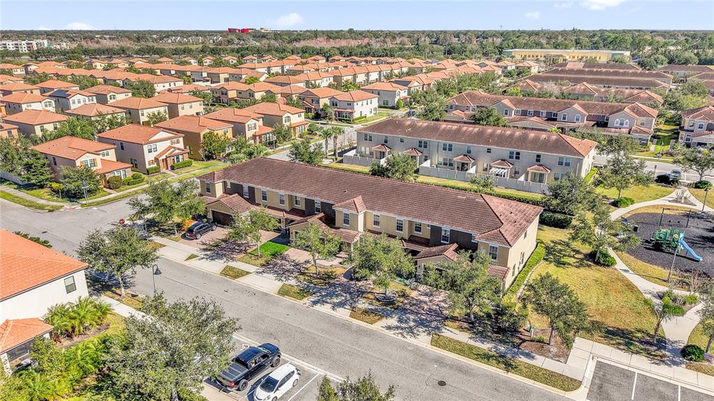2096 Water Tupelo Way Ocoee, FL 34761 - Photo 31 of 32 an aerial view of residential houses with outdoor space