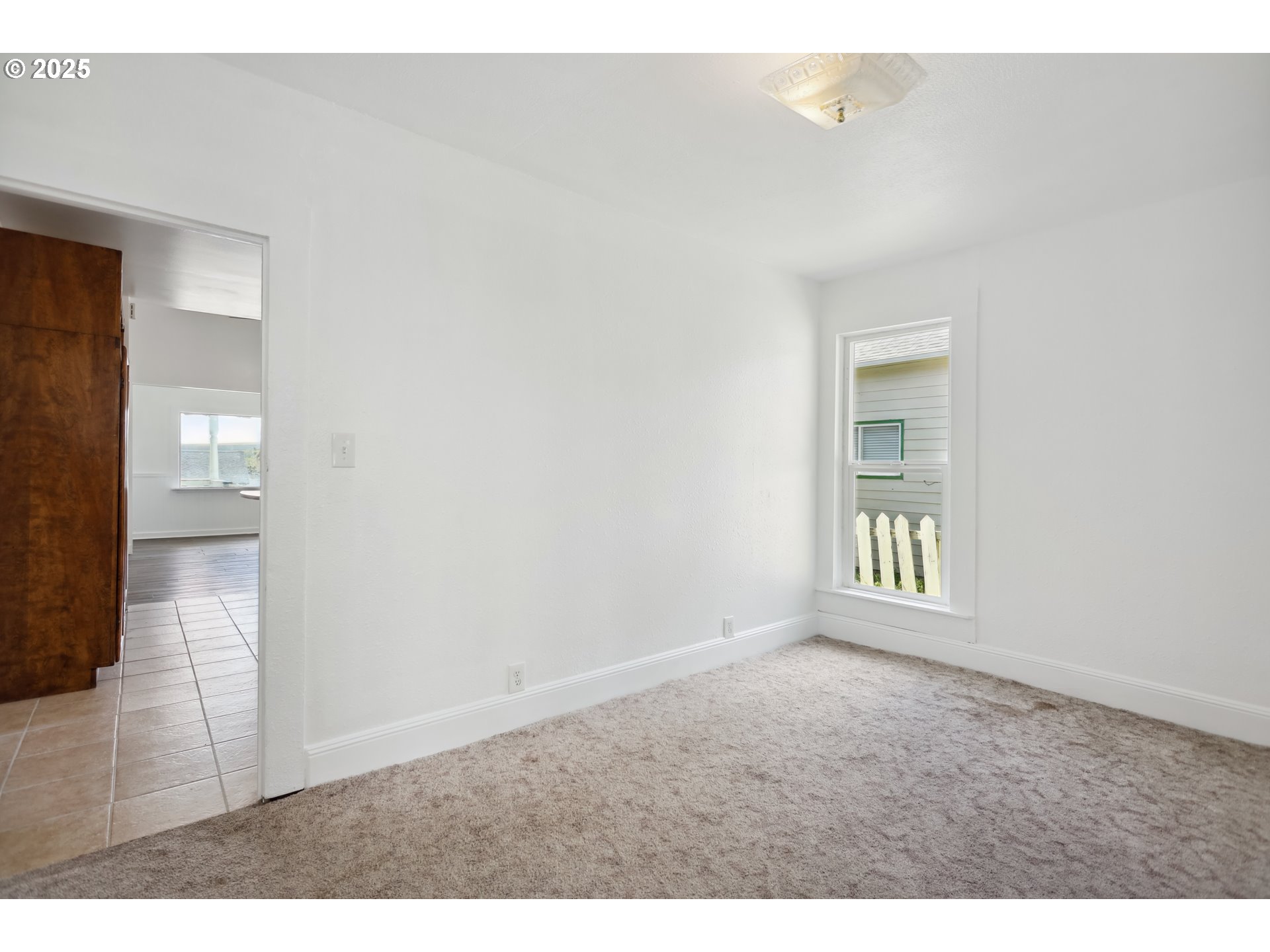 400 Mc Coy Street Moro, OR 97039 - Photo 17 of 33 a view of an empty room and window