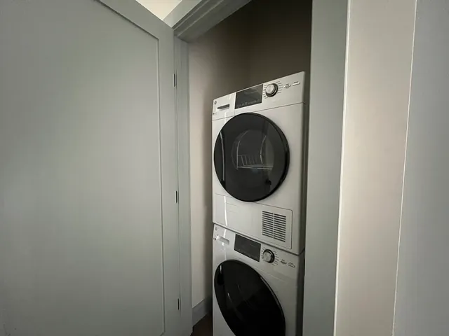 a close up view of a washer and dryer in a utility room