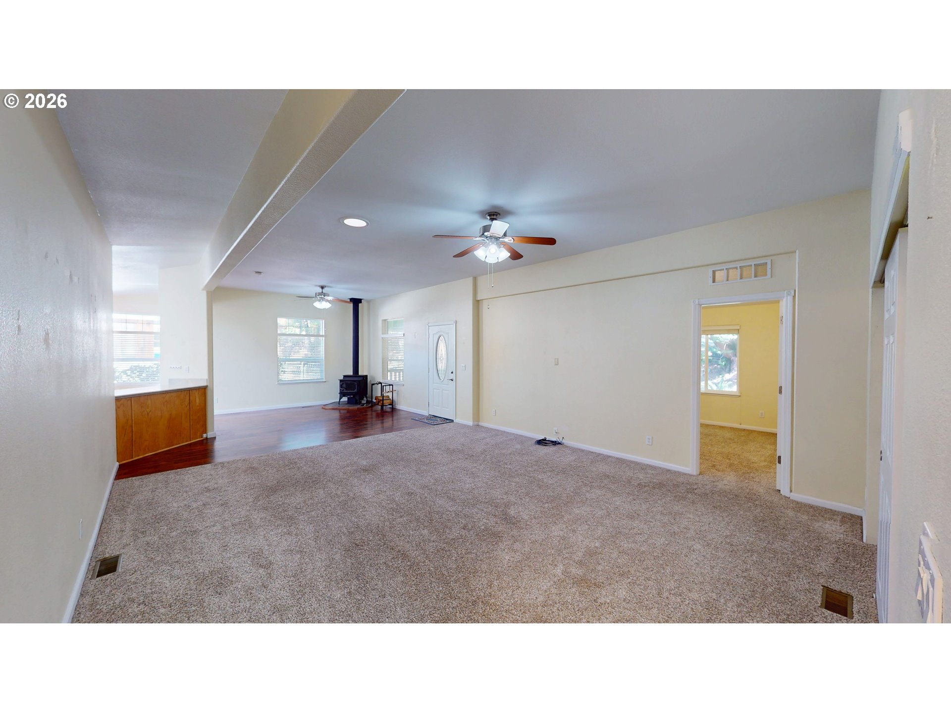 94355 11th Street Gold Beach, OR 97444 - Photo 17 of 41 a living room with furniture and a chandelier