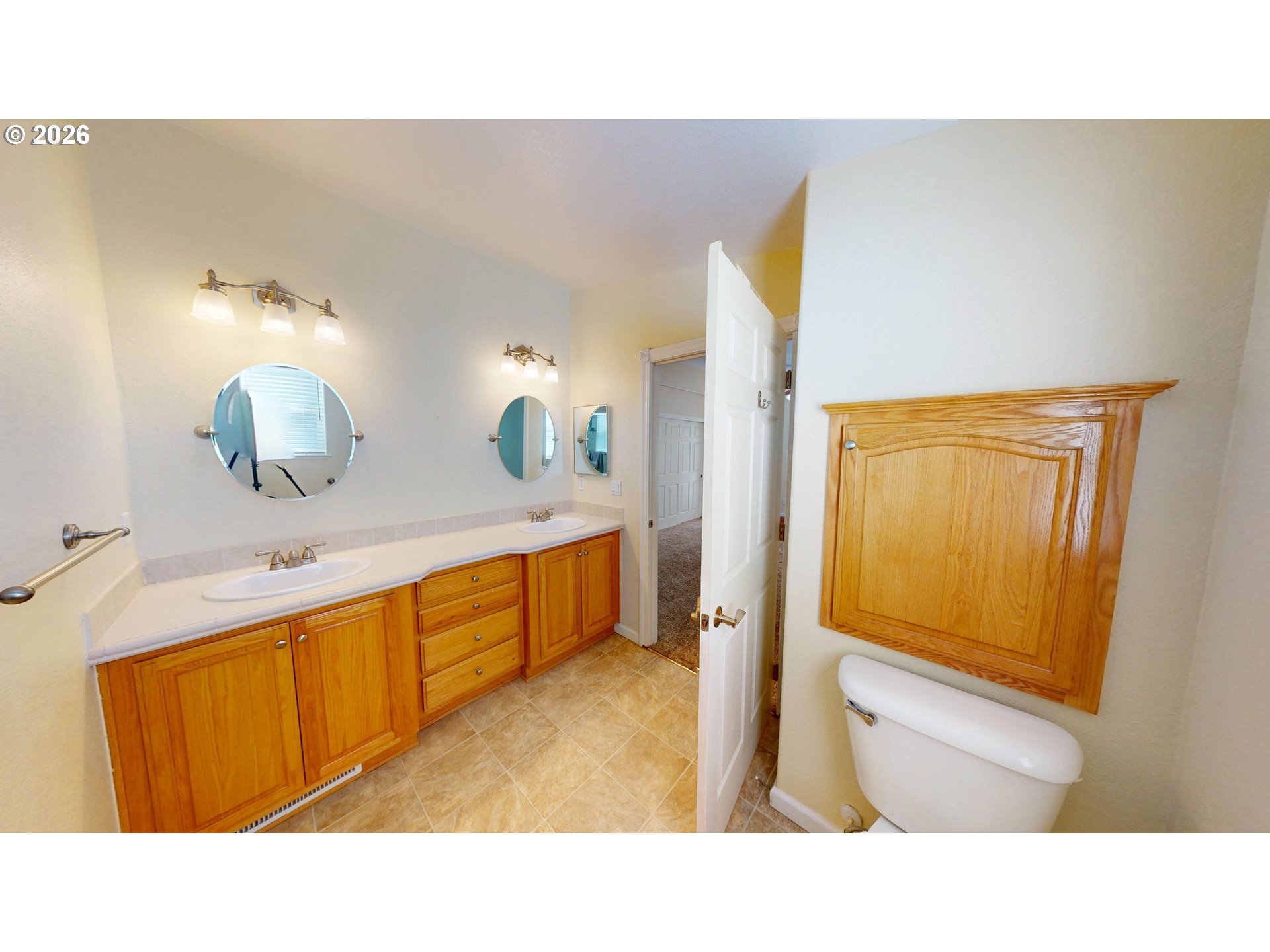 94355 11th Street Gold Beach, OR 97444 - Photo 26 of 41 a bathroom with a sink a mirror and a bathtub
