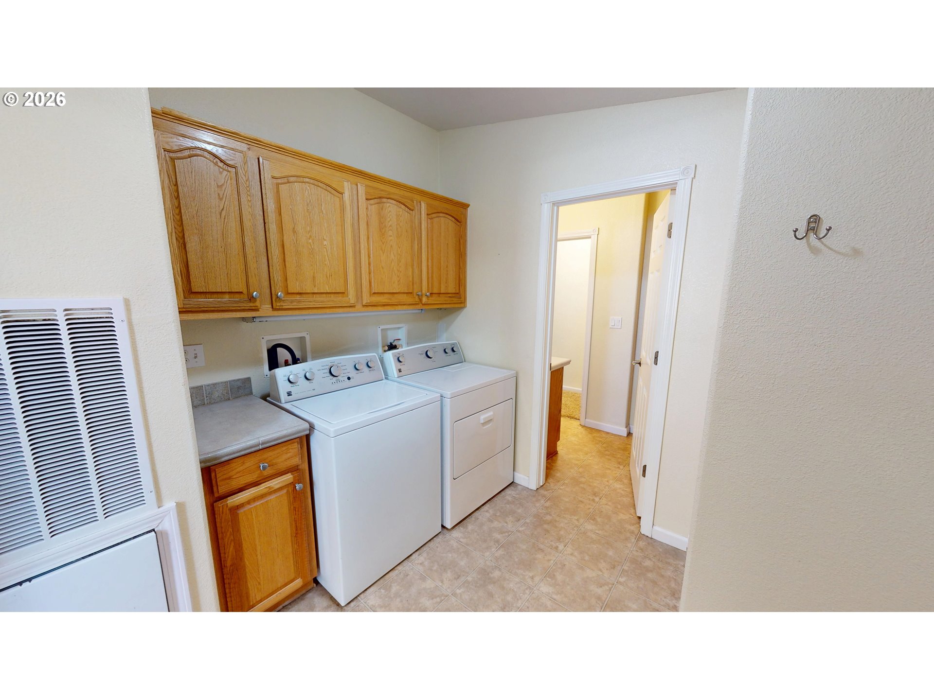 94355 11th Street Gold Beach, OR 97444 - Photo 32 of 41 a utility room with sink dryer and washer