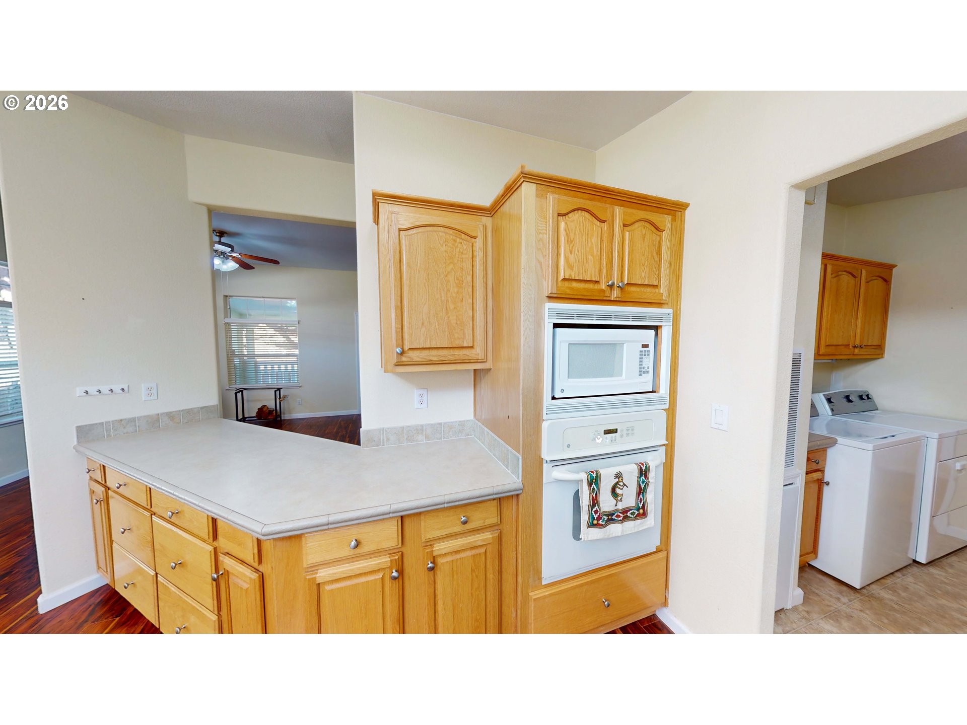 94355 11th Street Gold Beach, OR 97444 - Photo 7 of 41 a bathroom with a sink a vanity and a mirror